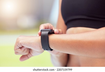 Smartwatch On Hands Of Runner To Track Woman Running Time, Health Stats And Train For Competition Race. Smart Watches Help Competitive Performance, Motivate And Inspire Athlete To Improve Record Time