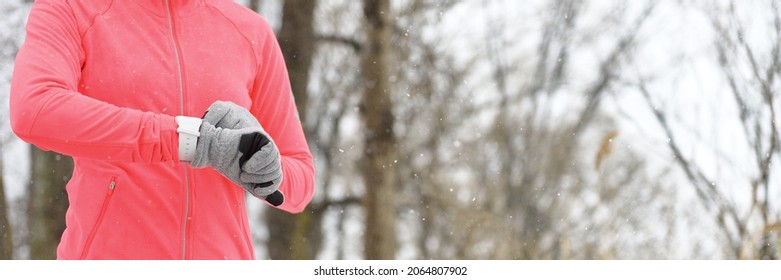 Smartwatch Sports Watch Athlete Running Using Smart Watch On Outdoor Winter Run With Cold Weather Gloves. Panoramic Banner Of Active Lifestyle With Technology.