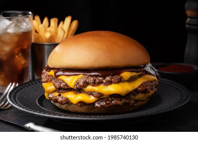 smash burger cheese on black plate cheddar 
