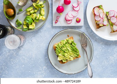 Smashed Avocado On Whole Grain Toast To Make Avocado And Radish Sandwiches