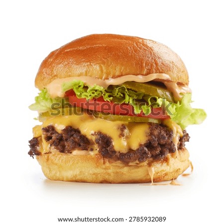 smashed beef burger with cheese. cheesy beef burger isolated on white background. creamy sauce on a glossy brioche bun isolated on a clean white background. Beef burger with cheese, lettuce, isolated