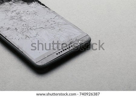 Smashed shattered broken screen of a mobile smartphone