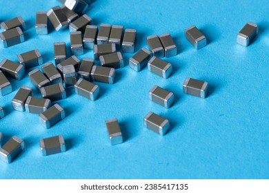 smd ceramic capacitors, on a blue table, electronic component
