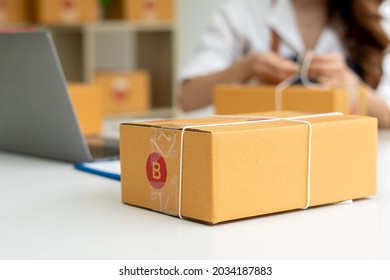 SME Business Online And Delivery Concept, Freelance Woman Working At Home With Online Parcel Delivery.