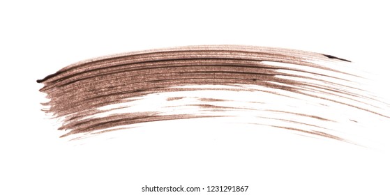 Smear Of Brown Mascara For Eyelashes Isolated On White Background.