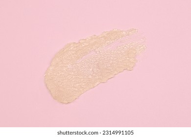 Smear of cream or vegan lip balm on pink background. Top view. Close up. - Shutterstock ID 2314991105