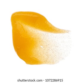 Smear Of Orange Sugar Scrub For Body And Lips Are Isolded On A White Background. Texture Of Cosmetic Body Scrub Orange Color