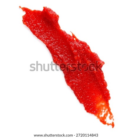 Smear of red tomato paste on white background