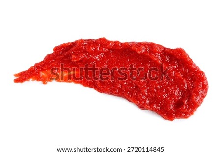 Smear of red tomato paste on white background