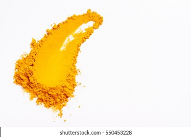 Smear of turmeric. Isolated on white. Up view. Empty space for text or inscription. 