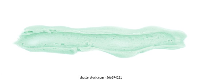 Smeared line of frosting cream isolated over the white background