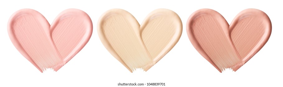 Smears of foundation for face.A smear of lipstick. Cosmetic smear of liquid. Isolated on white background - Shutterstock ID 1048839701