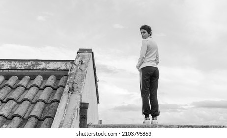 Smederevo, Serbia-October 2019: The Young Beautiful Alternative Girl With Short Hair And A Relaxed Outfit Standing On A Viewpoint And Enjoying The View During The Beautiful Autumn Day.