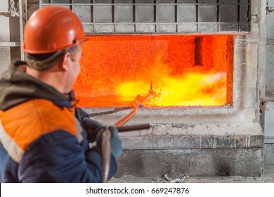 Smelter Near Melting Furnace With Molten Aluminum, Foundry, Russia