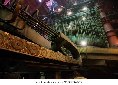 Smelter Workshop. Foreground In Focus. Electric Arc Furnace (blast Furnace) On Background Out-of-focus. Wide-angle Lens View.