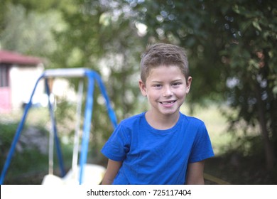 Smile Of 7-8 Years Old European Boy 