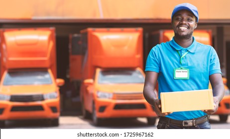 Smile African Man Postal Delivery Courier Man In Front Of Car Delivering Package
