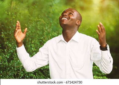 Smile african man praying for thank god.