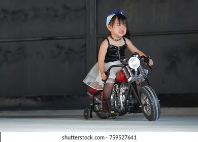 baby in motorcycle