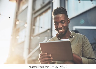 Smile, black man and tablet for internet scroll in outdoor cafe with social media update and ebook app for reading. African guy, tech and online research with restaurant website for recommendations - Powered by Shutterstock