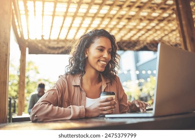 Smile, black woman and laptop for typing in cafe with social media post and email draft for remote work. African girl, computer and copywriting research in restaurant with website for online article