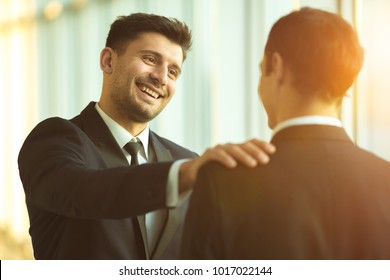 [Image: smile-businessmen-pat-on-shoulder-260nw-1017022144.jpg]