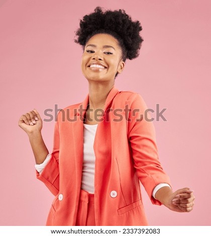 Smile, dancing and portrait of a woman in a studio with music, playlist or album for celebration. Happiness, excited and young African female model moving to a song isolated by a pink background.