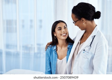 Smile, doctor and hug woman at hospital for consultation, discussion, support and medical advice of fertility report. Happy patient and healthcare worker for empathy, comfort and exam results of help - Powered by Shutterstock