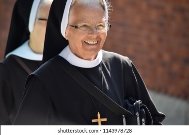 smile elderly nun in traditional clothes editorial, Prague, Czech Republic, July, 2018
