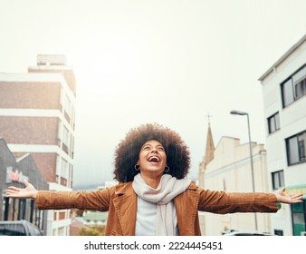Smile, happy and black woman with gratitude in a city with freedom, success and inspiration outdoors. Hope, god and excited African girl with grateful open hands, abundance and positive mindset - Shutterstock ID 2224445451