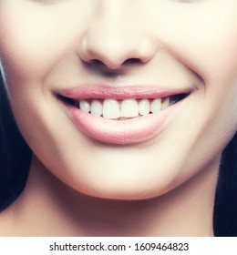 Smile lips. Close-up beauty model woman mouth with teeth smile, perfct skin, natural makeup