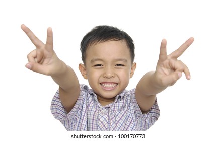 Smile Little Boy Holding Up The Peace Sign,