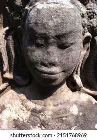 A smile on Apsara's face carved at Bayon Castle, Angkor Thom, Siem Reap, Cambodia.