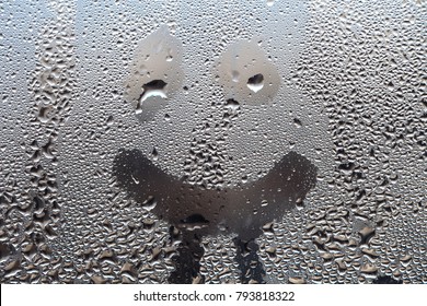 Smile On The Windowpane. Drops Of Water After Condensation.