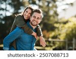 Smile, portrait couple and piggyback outdoor for summer holiday, marriage support or anniversary date. Happy, man and woman playful embrace of vacation travel, love together and bonding in nature