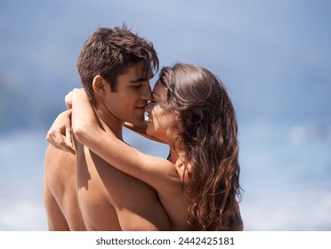 Smile, romance or couple hug at a beach to relax for holiday, vacation or anniversary in summer in Bali. Travel, affection or woman on date with love, care or man in nature, sea or ocean for wellness - Powered by Shutterstock