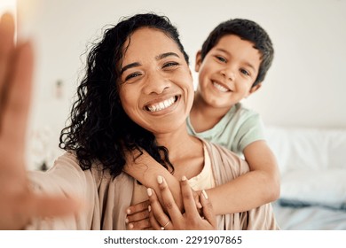 Smile, selfie and mother with child on a bed hug, love and bonding in their home together. Portrait, embrace or woman with son in bedroom waking up, happy and posing for profile picture, photo or pov - Shutterstock ID 2291907865