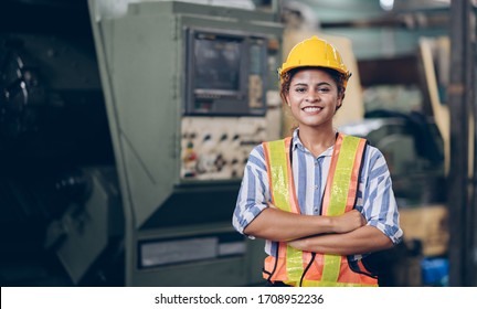 Smile technician engineer women  in factory