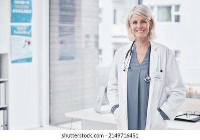 A Smile That Could Heal The Whole World. Portrait Of A Confident Mature Doctor Working At A Clinic.