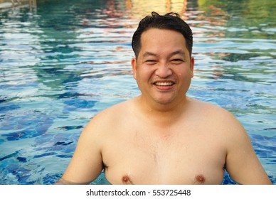 Smile Wet Asian Fat Man Portrait In Swimming Pool 