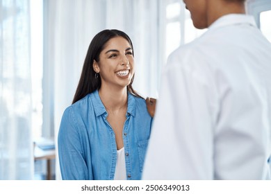 Smile, woman and doctor support in office for gynecology consultation, medical results and comfort of fertility exam. Happy, patient and healthcare with empathy, care and feedback advice at hospital - Powered by Shutterstock