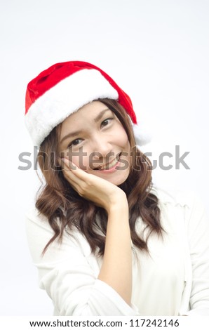 Smiley Asian woman in santa hat. isolated on white background