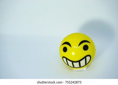 Smiley Emoji Yellow Stress Ball With White Background. Happy And Emoji Concept.