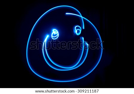 Smiley face painted in light