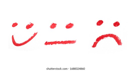 Smiley Face And Sad Drawing With Red Lipstick On White Background.