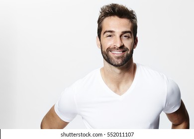 Smiley guy in white t-shirt, portrait