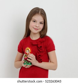 Smiley Little Girl And Russian Doll Matrioshka