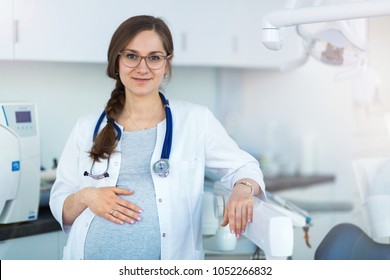 Pregnant doctor Smiling