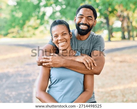 Smiling active young  couple having fun  together in the park, active healthy people bonding, couple happy relationship