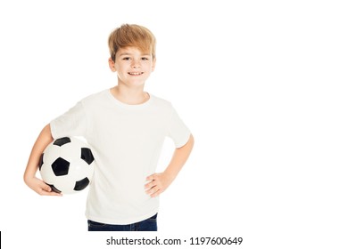 Smiling Adorable Boy Holding Football Ball And Looking At Camera Isolated On White